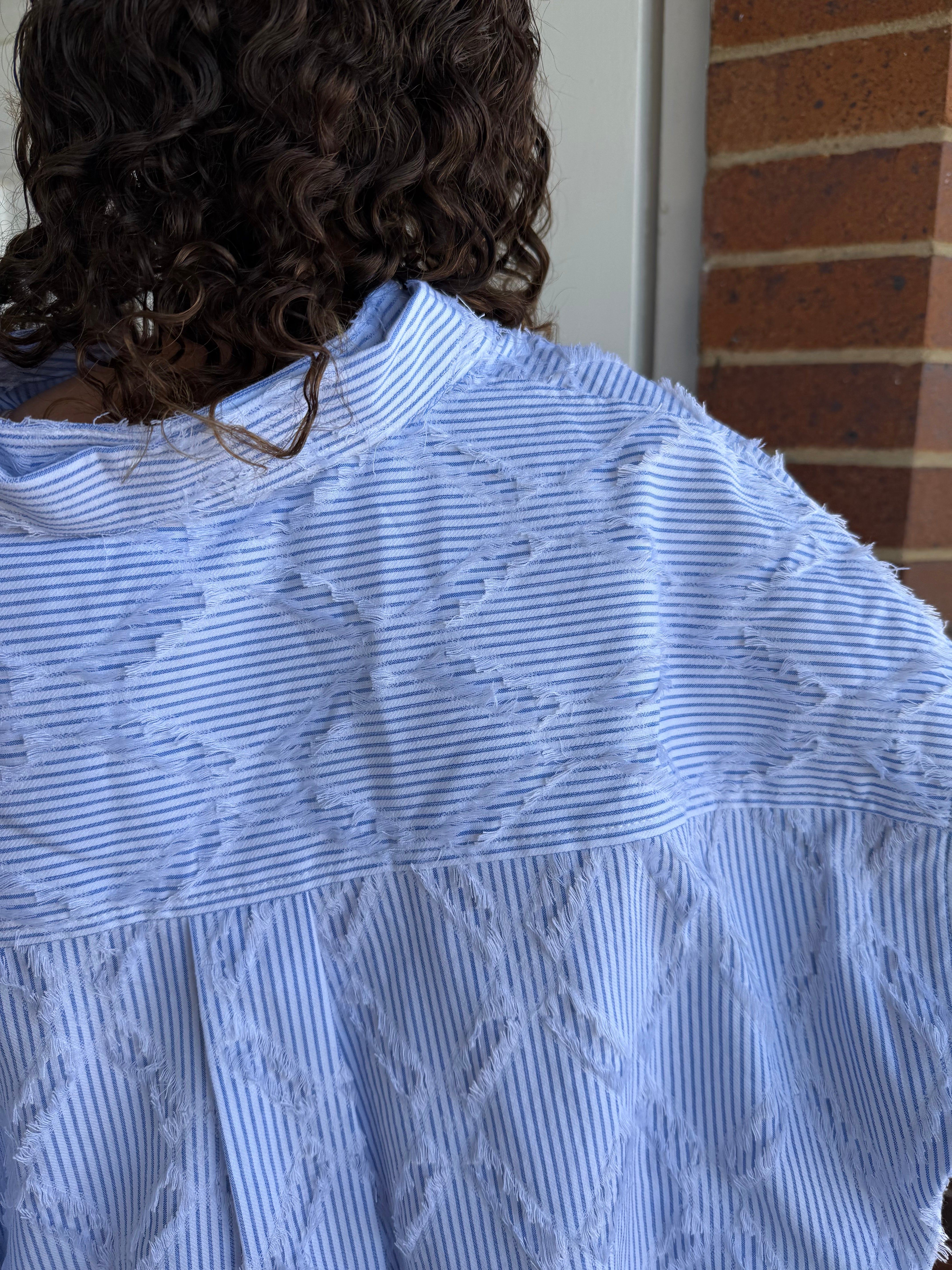 The Frayed Blouse